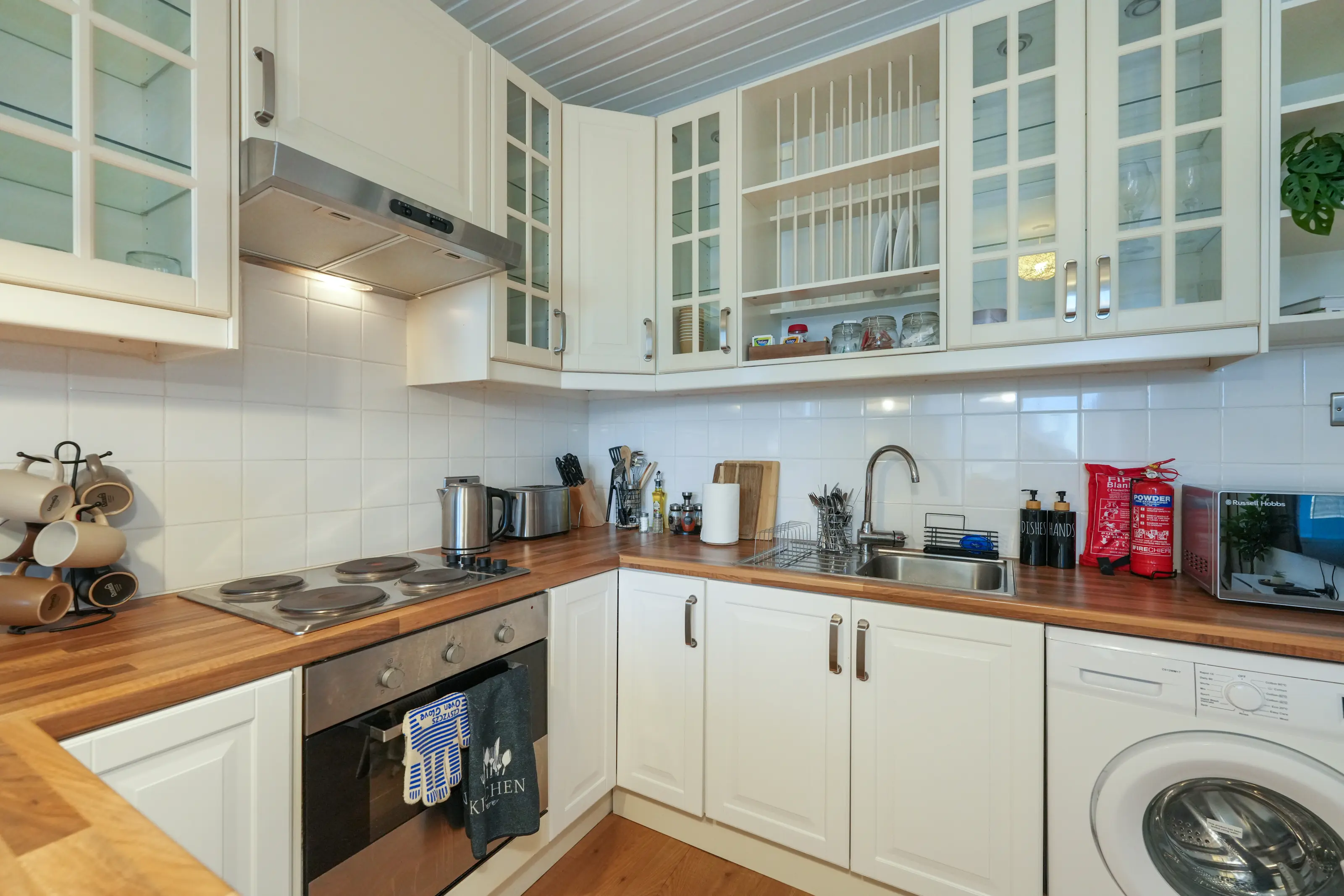 Modern cooking appliances and utensils in kitchen